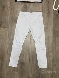 Jeans bianchi strappati