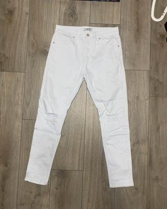 Jeans bianchi strappati