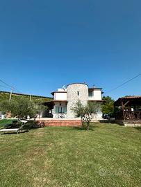 Camere in villa immersa nel verde