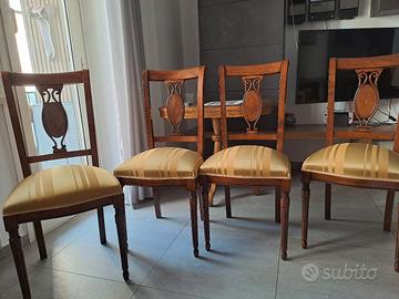 Set di quattro sedie in legno seduta imbottita 