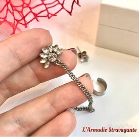 Orecchino earcuff fiore argentato punto luce
