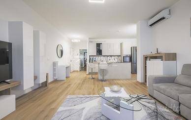 TRILOCALE AL PRIMO PIANO CON TAVERNA E BOX AUTO