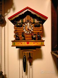 orologio a cucù con musicisti 