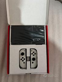 Nintendo switch  oled bianca+supersmash bros