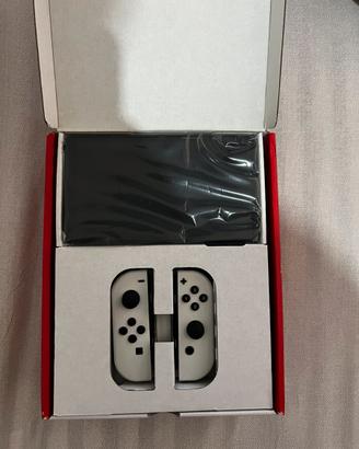Nintendo switch  oled bianca+supersmash bros