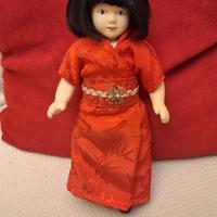 Bambola  in ceramica da collezione 