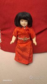 Bambola  in ceramica da collezione 