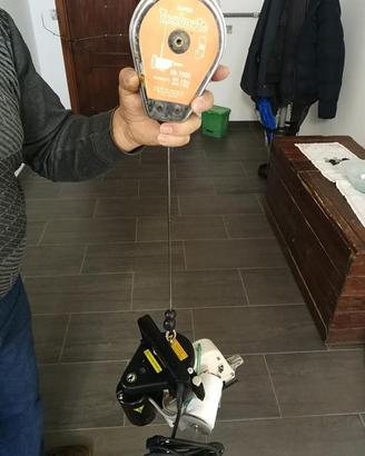 Elettrocucitrice portatile per  cucitura di sacc