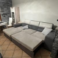 Divano estraibile con penisola contenitore