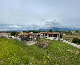 FABBRICATO ALLO STATO GREZZO CON TERRENO DI 1.8...