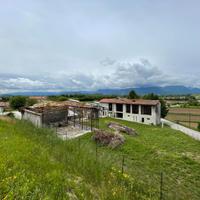 FABBRICATO ALLO STATO GREZZO CON TERRENO DI 1.8...