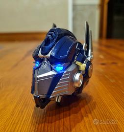 Casco Transformers Optimus Prime, Poster e Rubrica