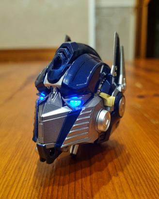Casco Transformers Optimus Prime, Poster e Rubrica