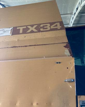 Mietitrebbia New Holland tx/34