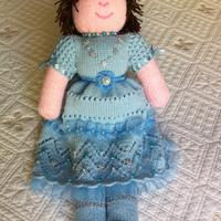 Bambola di lana fatta a mano