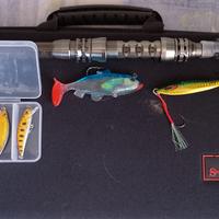 can a da pesca esche e mulinello 