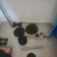 set di pesi in ghisa con bilanciere 