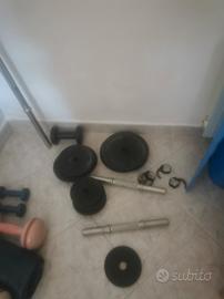 set di pesi in ghisa con bilanciere 