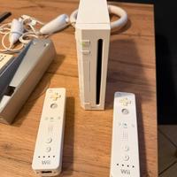 Nintendo Wii + 2 controller, + giochi + 2 volanti