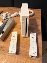 Nintendo Wii + 2 controller, + giochi + 2 volanti