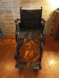 Sedia a rotelle più accessori