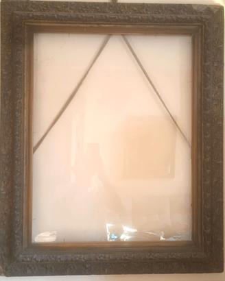 antica cornice in legno intagliato