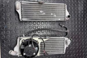 Radiatori + vaschetta + tubi husqvarna 610