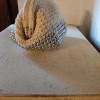 borsetta clutch da portare a mano