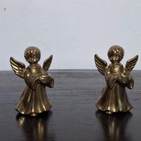 coppia di angeli in ottone.