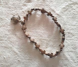 Bracciale elastico vintage con tartarughe e charms