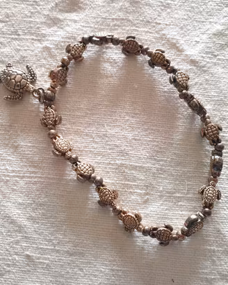 Bracciale elastico vintage con tartarughe e charms