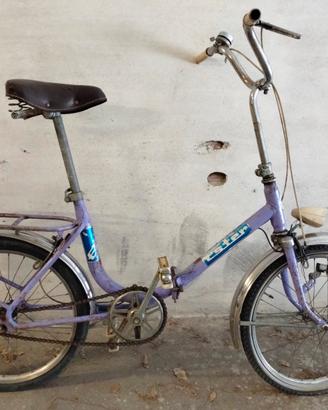 Bicicletta pieghevole viola vintage 