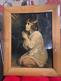 Quadro religioso con cornice.