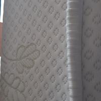 materasso e rete a doghe in legno 