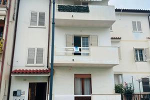 Appartamento con cortile e posto auto