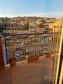 Stanza in famiglia, bagno e cucina in comune