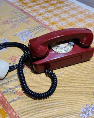 Telefono vintage a disco colore rosso anni 70