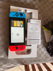 nintendo switch kit completo più 2 giochi