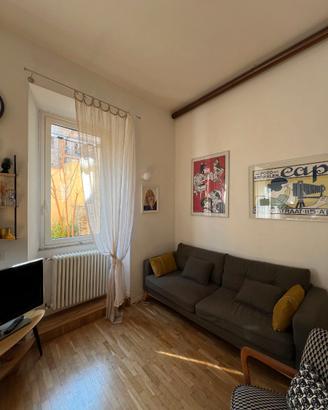 Divano letto trasformabile in stile scandinavo