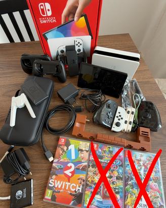 Nintendo Switch Oled + accessori e giochi