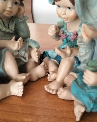 coppia di bomboniere bambini in resina 