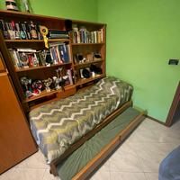 Letto e libreria Man camere per ragazzi