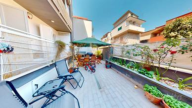 Tre vani ristrutturato con giardino e box
