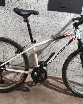 MTB bambino ROCKRIDER ST 100 24” + rotelle + casco