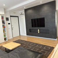 Appartamento su due livelli con giardino e garage