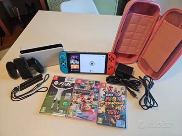 Nintendo switch OLED + 3 giochi + accessori 