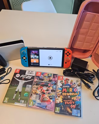 Nintendo switch OLED + 3 giochi + accessori 
