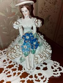 statuina in porcellana