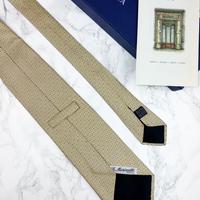 Cravatta E. Marinellagialla microfantasia cerchi