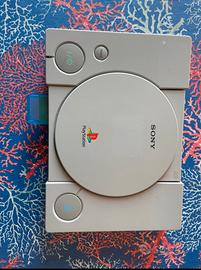 Playstation 1con cavi per muro e per televisione